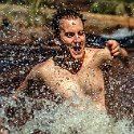 098 FacebookHeader AUS QLD PalmCreek 2011MAY21 RockSlidesWalk 053  A few of us Cannington Crew went for a walk out to the Palm Creek Rock Slides on a Saturday morning and as boys do, we couldn't resist hurtling down one of natures waterslides.    I was standing at the bottom of the watercourse, with my 400mm lens, risking either a collision or drowning my camera gear, but the results were worth the risk.    Just love how this photo captures the innocence of simply having fun. — at Palm Creek Rock Slides, Queensland, Australia.