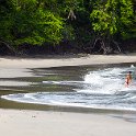 314 FacebookHeader CRI PUN ManuelAntonio 2019MAY16 PNMA 044  Not quite as grand as 4 Mile Beach, but the Costa Rican coastal scenery can be postcard picture perfect.   After taking this shot, I did warn the young lady of the hazards of frolicking about the ocean in such a manner may cause her to catch a pregnancy - but I don't think she understands Australian. — @ Manuel Antonio National Par, Puntarenas, Costa Rica : - DATE, - PLACES, - TRIPS, 10's, 2019, 2019 - Taco's & Toucan's, Americas, Central America, Costa Rica, Day, Manuel Antonio, May, Month, Parque Nacional Manuel Antonio, Puntarenas, Thursday, Year