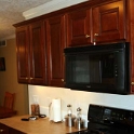 USA ID Boise 7011WAshland GF Kitchen 2006FEB21 003  Gas/electric stove topped by a combination microwave/vent fan. : 2006, 7011 West Ashland, Americas, Boise, February, Idaho, Kitchen, North America, USA