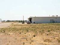 USA ID Caldwell 2002JUL21 FITZY SkydiveIdaho 003  The landing zone (or LZ). Try not to land on the hangars, the locals get a bit upset if you scratch the paint : 2002, Americas, Caldwell, Idaho, July, North America, Skydive Idaho, Skydiving, USA