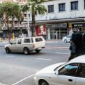 ZAF WC CapeTown 2016NOV14 StrandTowerHotel 001  While waiting for my tour bus to arrive, I noticed this fell just walking down the street with a cart in morning peak hour traffic and he was yelling out at the top of his lungs bout something. : 2016, 2016 - African Adventures, Africa, November, South Africa, Southern, Western Cape, Cape Town, Strand Tower Hotel