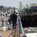 USA CA SantaMonica 2005MAY03 014  There were plenty of fishing poles on the pier. The best thing you could hope to catch was a cold as most of it looked like blind mullet. : 2005, 2005 - Pasadena, Americas, California, Date, May, Month, North America, Places, Santa Monica, Trips, USA, Year