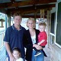 AUS NSW Terranora 1999NOV19 003  Ronny "Ronzo" Donnelly with his wife Lee and the two billy lids. : 1999, 2001 - Get In Get Out, No Mucking About Australian Trip, Australia, Date, Month, NSW, November, Places, Terranora, Trips, Year