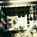 USA ID Boise 1112North7th 1996JUN15 FrontDoors 001  As part of the front entrance replacement, I built the custom door frame which included glass panelled alcoves the doubles as a neat little shelving system. : 1996, 7011 West Ashland, Americas, Boise, Exterior, Fitzy's Poverty Palaces, Front Door, Idaho, June, North America, USA