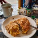 CRI PUN Quepos 2019MAY17 003  Breakfast was a local affair at the   Soda Sanchez  , where for a measly 4850   Col&oacute;ns   ( $8.41 USD ) I thoroughly enjoyed an awesome   Empanadas de Pollo   ( Chicken Empanada ), a breakfast beef burrito and some great coffee - figuring the big breakfast would tide me over until dinner tonight. I have to say, the empanadas was the best I’ve had – period! : - DATE, - PLACES, - TRIPS, 10's, 2019, 2019 - Taco's & Toucan's, Americas, Central America, Costa Rica, Day, Friday, May, Month, Puntarenas, Quepos, Year