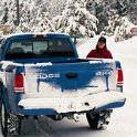 USA ID McCall 2001JAN13 006  One of the crew, Trina, writes my name on the back of my ute. : 2001, 2001 - 2nd Annual Bed & Sled, Idaho, January, McCall, North America, USA
