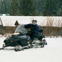 USA ID Warren 2002JAN19 016  Sipper on the fly on his sled. : 2002, 2002 - 3rd Annual Bed & Sled, Idaho, January, North America, Places, USA, Warren