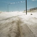 USA WY Wagonhound 2002MAR03 001  We pulled over at a rest stop for a leak and yes, that is the road with snow and ice on it. : 2002, 2002 - Booze Bothers Tour, Americas, March, North America, USA, Wagonhound, Wyoming