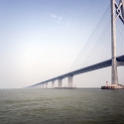 AS CHN SC HKG NEW ISL Zhujiang 2017AUG30 RiverEstuary 004  I was looking out the ferry window when all of a sudden, a huge bridge seemingly pops up out of the water and stretches from horizon to horizon. I had no idea about the structure, but subsequently came to find out that the 34 mile ( 55 kilometre )  " Hong Kong–Zhuhai–Macau Bridge "  bridge and tunnel project has some pretty impressive numbers, in linking Hong Kong and Macau with the mainland China. : - DATE, - PLACES, - TRIPS, 10's, 2017, 2017 - EurAsia, Asia, August, China, Day, Eastern, Hong Kong, Hong Kong–Zhuhai–Macau Bridge, Islands, Month, New Territories, River Estuary, South Central, Wednesday, Year, Zhujiang