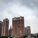 AS CHN SW SIC LES Emeishan 2017AUG17 002  One clear indicator that you're in China is that the are high-rise apartments on every skyline. : 2017, 2017 - EurAisa, Asia, August, China, DAY, Eastern Asia, Emeishan, Leshan, Sichuan, Southwest, Thursday