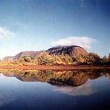 AUS NT AyersRock 1993MAY 016  You wouldn't believe what a little cloud and rain does to the colour of the rock : 1993, Australia, Ayers Rock, May, NT