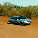 AUS NT KingsCanyon 1992 Driving 002  About 100 km (60 miles) of the journey is driving on a very winding and corrugated dirt road which becomes boggy or slippery when wet. : 1992, Australia, Date, Kings Canyon, NT, Places, Year