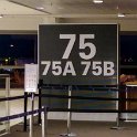 AUS QLD Brisbane 2016NOV11 Airport 002  Have to laugh - a woman comes up to me , with her British passport and boarding pass in hand, while I'm standing next to this sign and says "I'm looking for Gate 75"    I turn my head slightly and respond while looking at the sign "Not sure, but I think you're close"    There is a village rejoicing somewhere I reckon!!! : 2016, 2016 - African Adventures, Australia, Brisbane, Date, International Airport, Month, November, Places, QLD, Trips, Year
