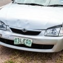 AUS QLD HomeHill 2013MAR19 Accident 004  Her sudden injury recollection may have been because this Mazda pushed the green car into my car for a second time. : 2013, 2013 - Going Coastal Road Trip, Australia, Date, Home Hill, March, Month, Places, QLD, Trips, Year